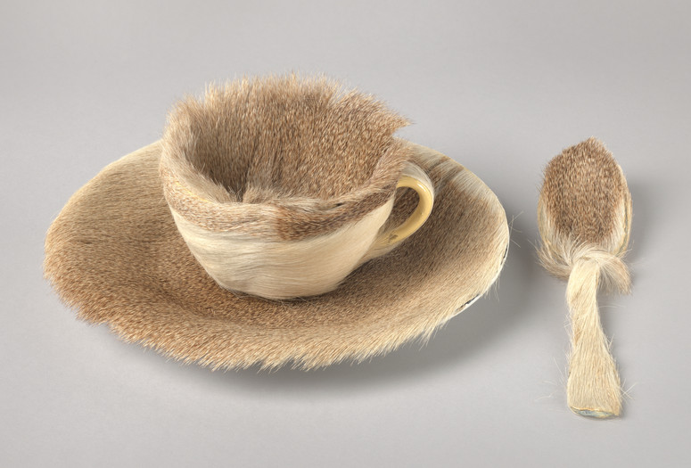 Meret Oppenheim. Object. 1936. Fur-covered cup, saucer, and spoon, cup 4 3/8" (10.9 cm) in diameter; saucer 9 3/8" (23.7 cm) in diameter; spoon 8" (20.2 cm) long, overall height 2 7/8" (7.3 cm). Purchase. © 2019 Artists Rights Society (ARS), New York/Pro Litteris, Zurich