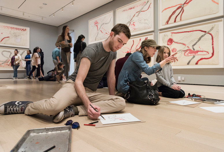 Visitors participating in activities in Louise Bourgeois: An Unfolding Portrait. The Museum of Modern Art, New York, September 24, 2017–January 28, 2018. © The Easton Foundation/VAGA at ARS, NY. Photo: Martin Seck