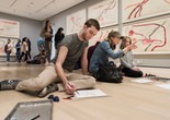 Visitors participating in activities in Louise Bourgeois: An Unfolding Portrait. The Museum of Modern Art, New York, September 24, 2017–January 28, 2018. © The Easton Foundation/VAGA at ARS, NY. Photo: Martin Seck