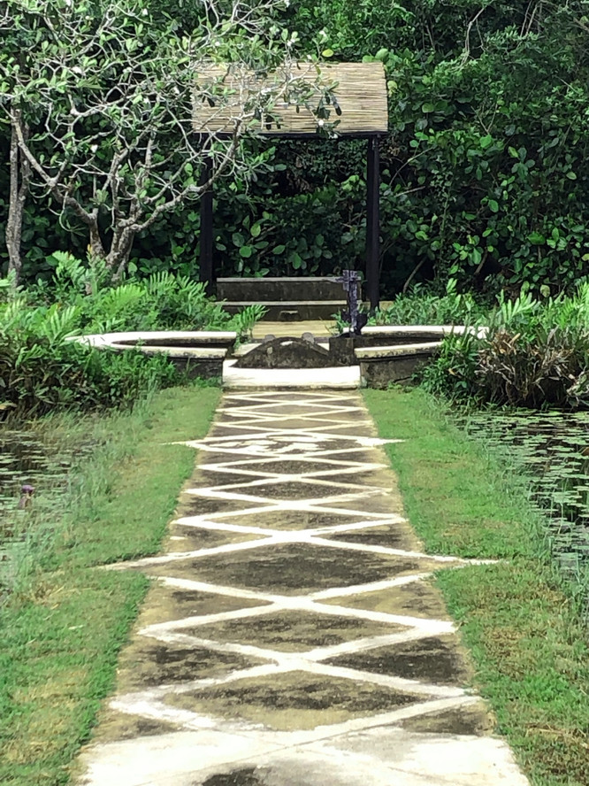 View of Black Pavilion and sundial sculpture by Laki Senanayake
