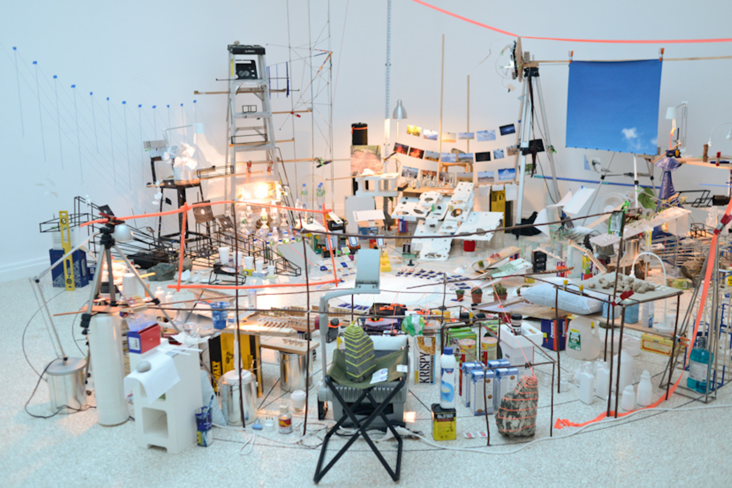 Sarah Sze. Triple Point (Pendulum). 2013. Salt, water, stone, string, projector, video, pendulum, and other materials, dimensions variable, approximately 150 × 210 × 200" (381 × 533.4 × 508 cm). Gift of the International Council of The Museum of Modern Art, Agnes Gund, Ronald S. and Jo Carole Lauder, and Sharon Percy Rockefeller, in honor of the 60th Anniversary of the International Council
