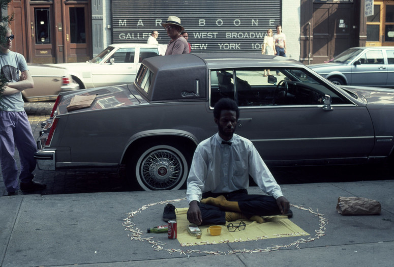 Pope.L. Thunderbird Immolation a.k.a Meditation Square Pieces. 1978. Digital c-print on gold fiber silk paper. 9 × 6" (22.86 × 15.24 cm). © Pope.L. Courtesy the artist and Mitchell – Innes & Nash, New York