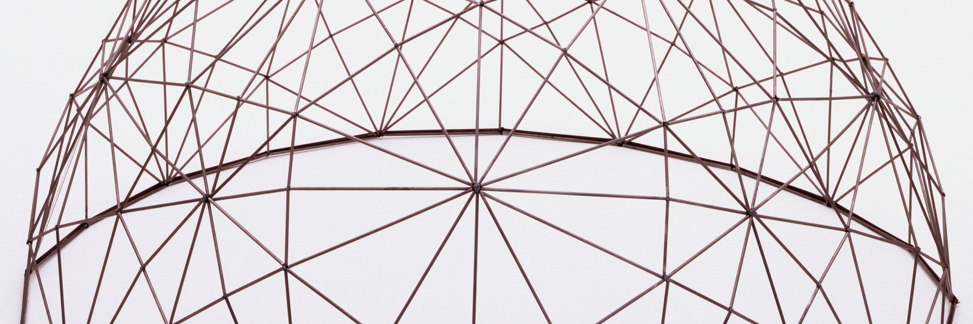 R. Buckminster Fuller. Geodesic Dome. 1952. Elastic cord and metal, h. 20 1/4&#34; (51.4 cm), diam. 39&#34; (99.1 cm). Model maker: Alan Borg, Joan Forrester, Ron Goodfellow, John Hampshire, T. C. Howard, Fred Taylor. Gift of the architect