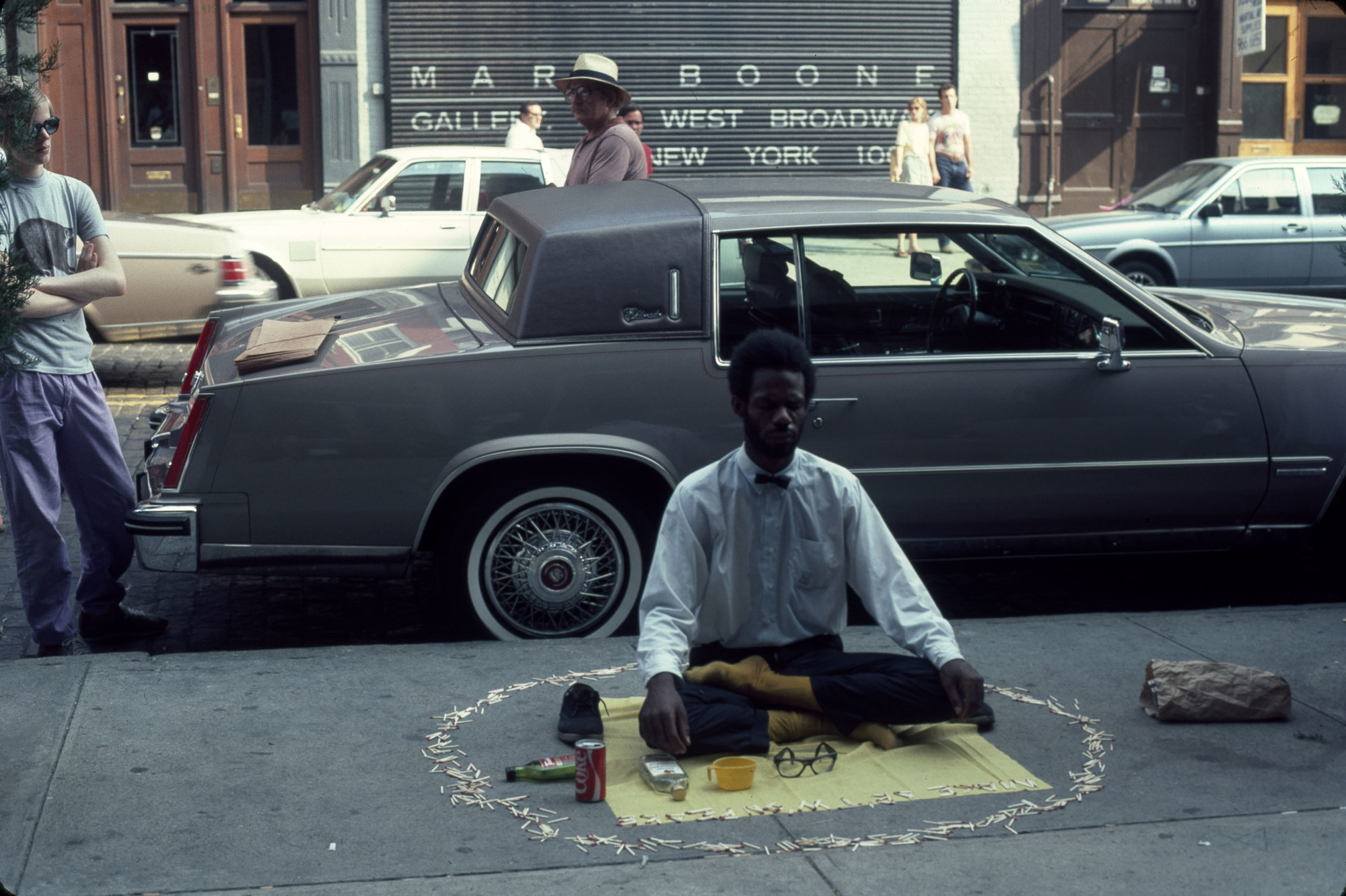 Pope.L (American, born 1955). _Thunderbird Immolation a.k.a. Meditation Square Piece, West Broadway, New York_. 1978. Inkjet print, 10 × 15" (25.4 × 38.1 cm). The Museum of Modern Art, New York. Acquired in part through the generosity of Jill and Peter Kraus, Anne and Joel S. Ehrenkranz, The Contemporary Arts Council of The Museum of Modern Art, The Jill and Peter Kraus Media and Performance Acquisition Fund, and Jill and Peter Kraus in honor of Michael Lynne. © Pope.L, courtesy the artist