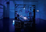Janet Cardiff and George Bures Miller. The Killing Machine. 2007. Pneumatics, robotics, electromagnetic beaters, dentist chair, electric guitar, CRT monitors, computer, various control systems, lights, and sound (approx. 5 min.). 9′ 10″ x 13′ 1″ x 8′ 2″ (118 x 157 x 98 cm). The Museum of Modern Art, New York. Gift of the Julia Stoschek Foundation, Düsseldorf, and the Dunn Bequest. © 2019 Janet Cardiff and George Bures Miller. Photo: Seber Ugarte &amp; Lorena López. Courtesy the artists and Luhring Augustine, New York.