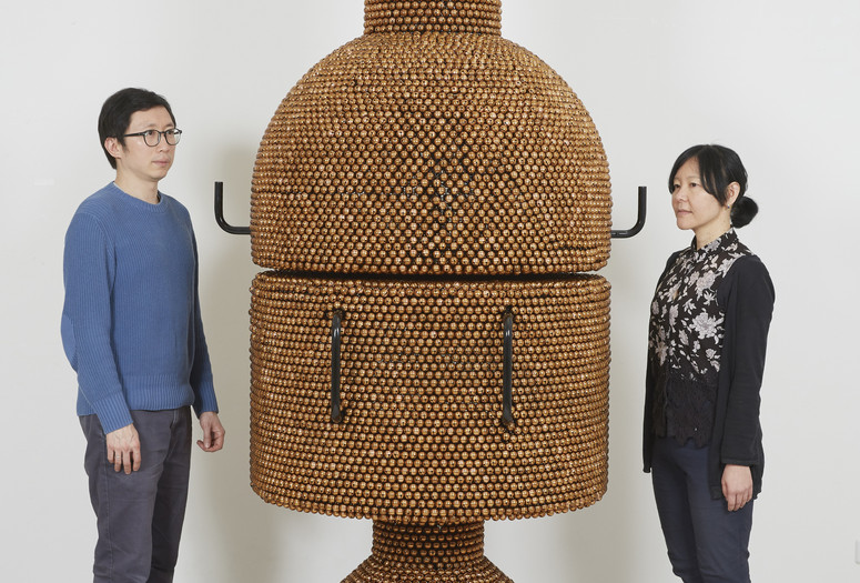 Haegue Yang. Sonic Coupe Copper – Enclosed Unity from the installation Handles. 2019. Powder-coated steel frame, mesh, and handles, casters, nickel-plated bells, and metal rings, 240 × 190 × 265 cm. Commissioned for the Marron Atrium by The Museum of Modern Art, New York. © Haegue Yang.