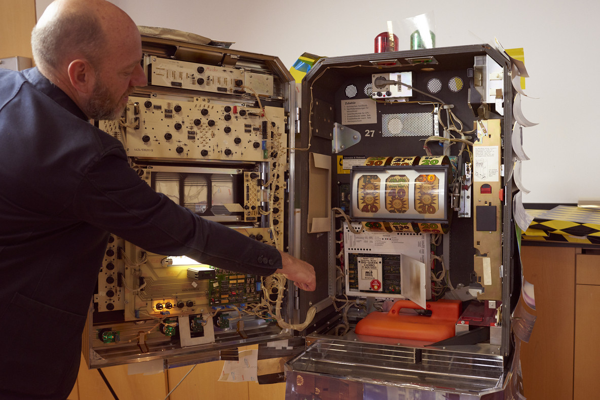 Roger Griffith with interior of Spielautomat (Slot Machine). Photo: Meron Menghistab