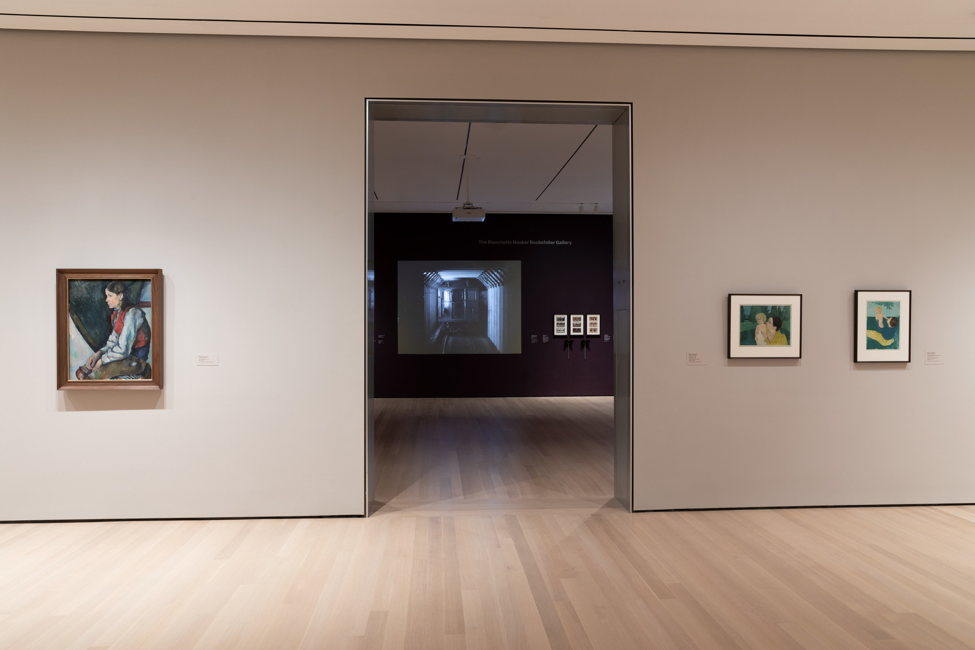 On the wall, from left: Paul Cézanne’s Boy in a Red Vest (1888–90) and Mary Cassat’s By the Pond (c. 1898) and Under the Horse-Chestnut Tree (1896–97)