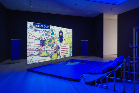 Hito Steyerl (German, born 1966). Liquidity Inc.. 2014. Video (color, sound; 30 min.) and architectural environment, Dimensions variable. Gift of the artist. The Museum of Modern Art, New York © 2019. Photographer: Denis Doorly