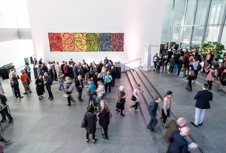 A view of the Agnes Gund Garden Lobby. Shown: Brice Marden. The Propitious Garden of Plane Image, Third Version. 2000–06. Oil on linen, six panels. Gift of Donald B. and Catherine C. Marron. © 2019 Brice Marden. Photo: Austin Donohue