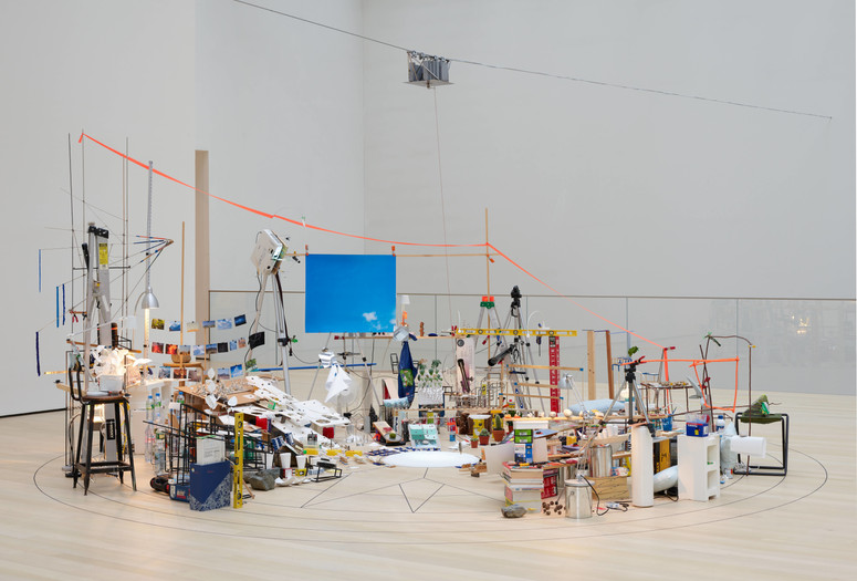 Sarah Sze. Triple Point (Pendulum). 2013. Salt, water, stone, string, projector, video, pendulum, and other materials, dimensions variable, approximately 150 × 210 × 200" (381 × 533.4 × 508 cm). Gift of the International Council of The Museum of Modern Art, Agnes Gund, Ronald S. and Jo Carole Lauder, and Sharon Percy Rockefeller, in honor of the 60th Anniversary of the International Council