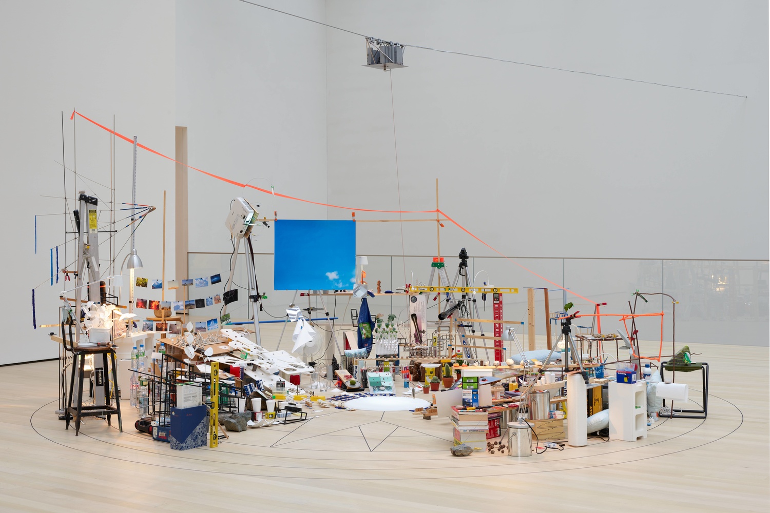 Sarah Sze. Triple Point (Pendulum). 2013. Salt, water, stone, string, projector, video, pendulum, and other materials, dimensions variable, approximately 150 × 210 × 200" (381 × 533.4 × 508 cm). Gift of the International Council of The Museum of Modern Art, Agnes Gund, Ronald S. and Jo Carole Lauder, and Sharon Percy Rockefeller, in honor of the 60th Anniversary of the International Council