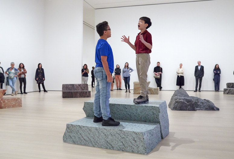 Jennifer Allora (American, born 1974). Guillermo Calzadilla (Cuban, born 1971). Fault Lines. 2013. Ten metamorphic and igneous rocks, live performance by two boy soprano singers. Music: Guarionex Morales-Matos (Puerto Rican, born 1968). Libretto: Allora & Calzadilla. The Museum of Modern Art, New York. Gift of Bob Rennie, 2016. © 2019 Jennifer Allora and Guillermo Calzadilla. Installation view, October 21, 2019-January 4, 2020, The Museum of Modern Art, New York. Image © 2019 The Museum of Modern Art. Photo: Heidi Bohnenkamp