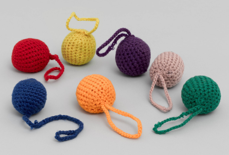 J.L. Hammett Co. Gift 1: Balls, Kindergarten. 1898. Material based on the educational theories of Friedrich Froebel, Wool. 2&#34; (5.1 cm) each. Gift of Lawrence Benenson