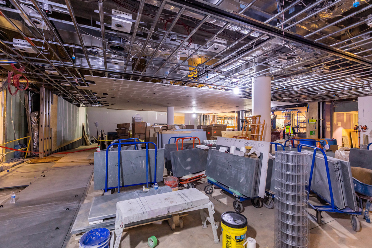 Stone being installed in the MoMA lobby