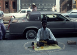 Pope. L. Thunderbird Immolation a.k.a Meditation Square Pieces. New York, NY 1978. Digital c-print on gold fiber silk paper. 9 x 6 in. 22.86 x 15.24 cm. © Pope. L. Courtesy of the artist and Mitchell – Innes &amp; Nash, New York