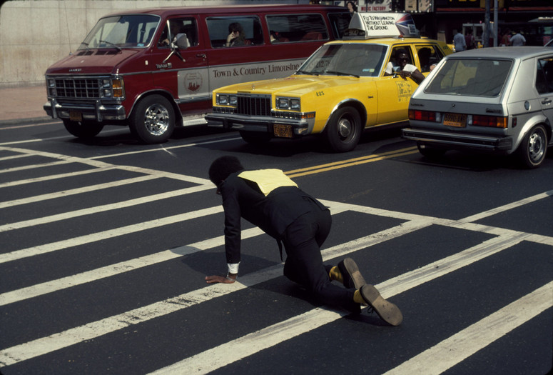 Pope. L. Times Square Crawl a.k.a Meditation Square Pieces. 1978. New York. Digital c-print on gold fiber silk paper. 10 x 15 in. 25.4 x 38.1 cm. © Pope.L. Courtesy of the artist and Mitchell – Innes & Nash, New York