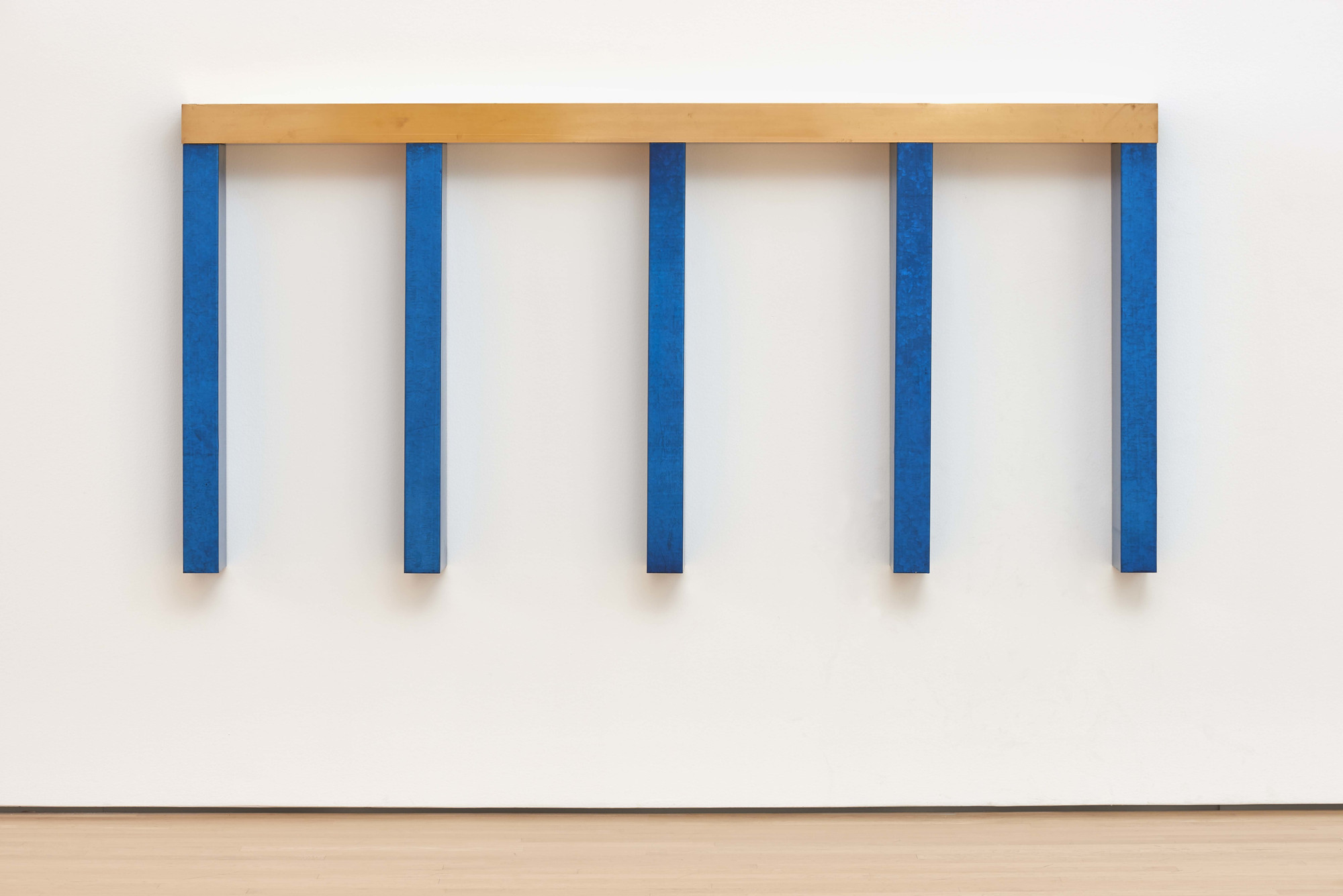 Donald Judd. _Untitled_ . 1964. Brass and galvanized iron with blue lacquer. 40 ½ × 84 × 6 3" (102.9 × 213.4 × 17.2 cm). National Gallery of Canada, Ottawa. © 2020 Judd Foundation / Artists Rights Society (ARS), New York
