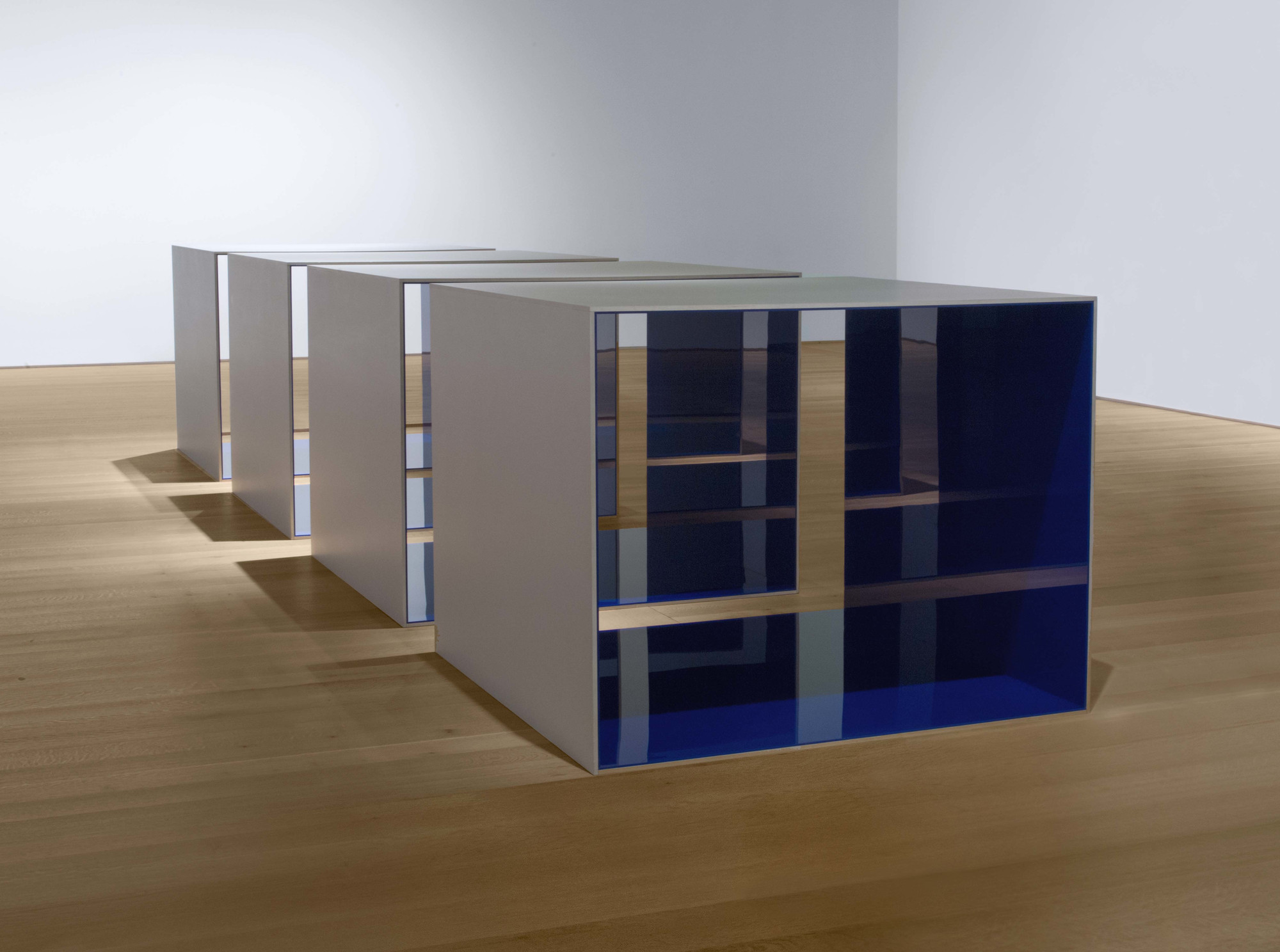 Donald Judd. _Untitled_. 1969. Clear anodized aluminum and blue Plexiglas. Four units, each 48 × 60 × 60" (121.9 × 152.4 × 152.4 cm), with 12" (30.5 cm) intervals. Overall: 48 × 276 × 60" (121.9 × 701 × 152.4 cm). Saint Louis Art Museum. © 2020 Judd Foundation / Artists Rights Society (ARS), New York