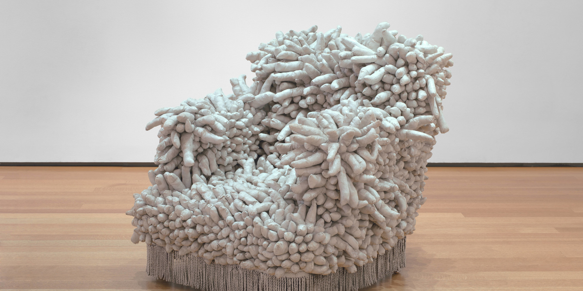 Yayoi Kusama. Accumulation No. 1. 1962. Sewn stuffed fabric, paint, and chair fringe, 37 × 39 × 43" (94 × 99.1 × 109.2 cm). Gift of William B. Jaffe and Evelyn A. J. Hall (by exchange). © 2020 Yayoi Kusama