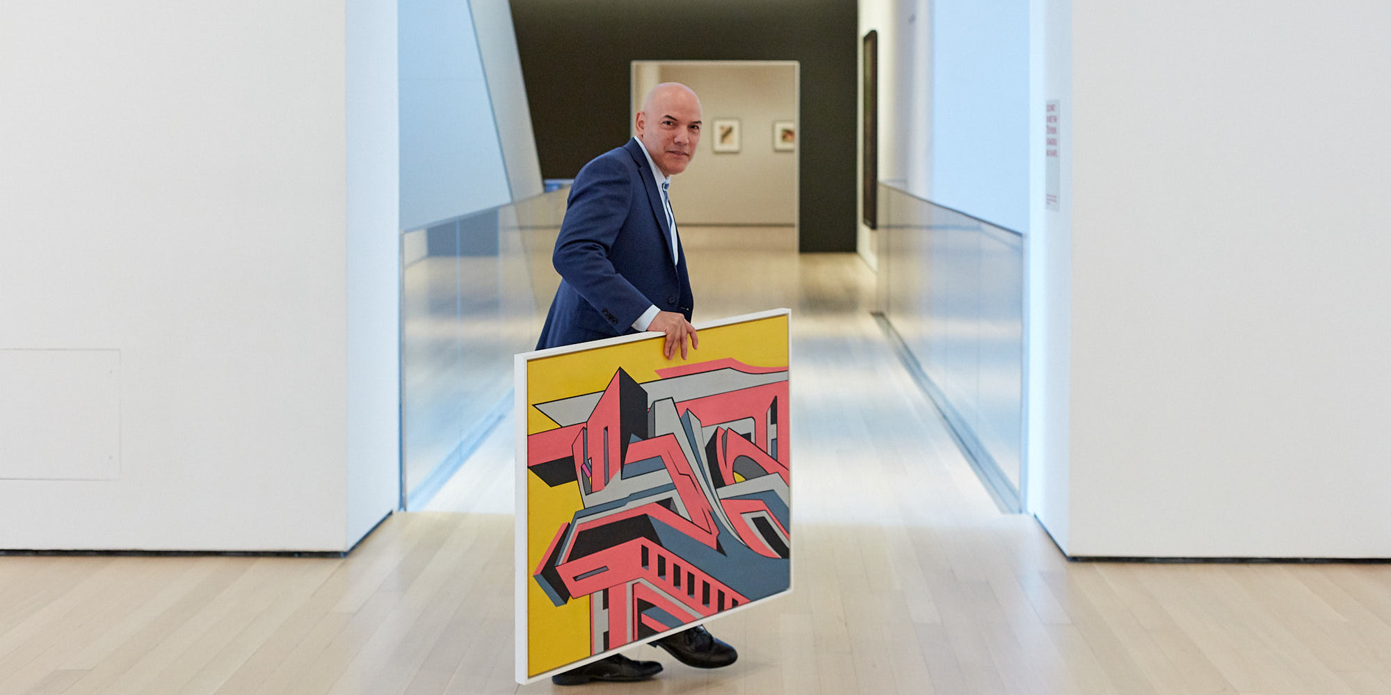 José Colon in the Museum galleries with his painting. Photo: Beatriz Meseguer/onwhitewall.com