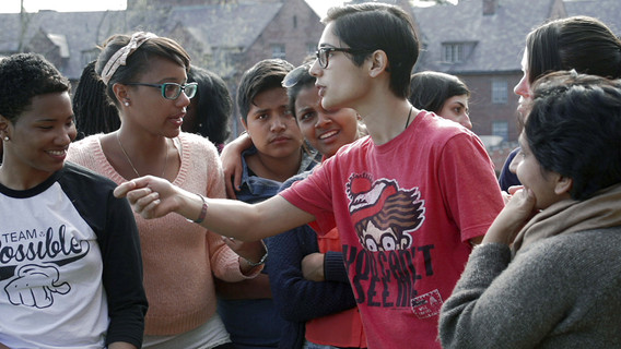 Sharon Hayes. Ricerche: three. 2013. HD video still. Left to right: Jasmine Brown, Laakan McHardy, Pavel Lopez, Anarkalee Perera, Zehra Ali Khan, Alyssa Simari, Lyla Eaton, and Sara Amjad