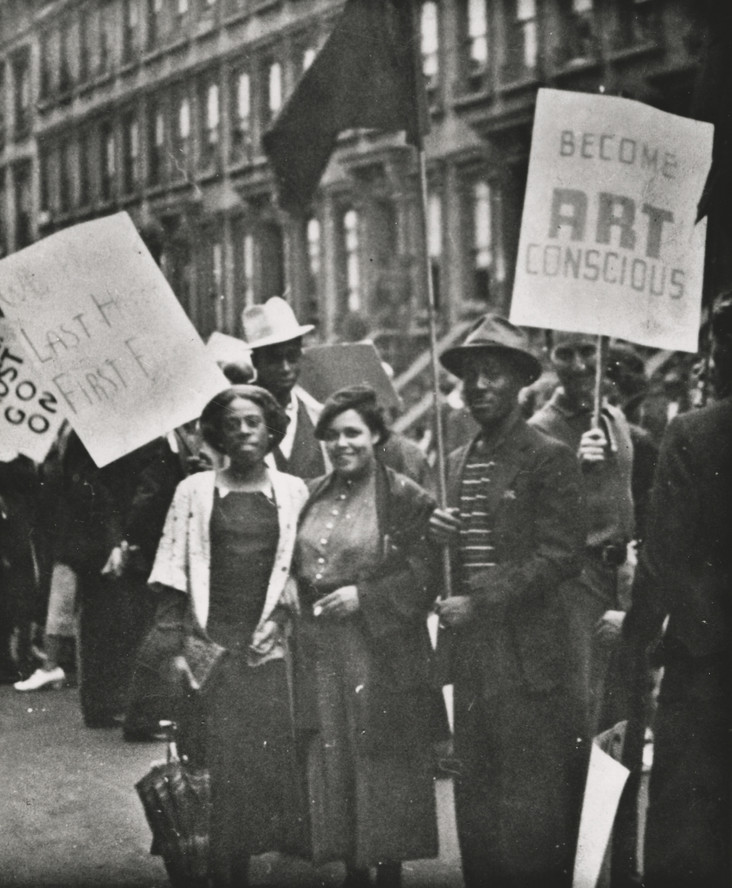 Harlem Artists’ Guild and Artists’ Union members picketing, late 1930s. Gwendolyn Bennett is at center, Norman Lewis is on the right; behind them in a white hat is Frederick Perry.