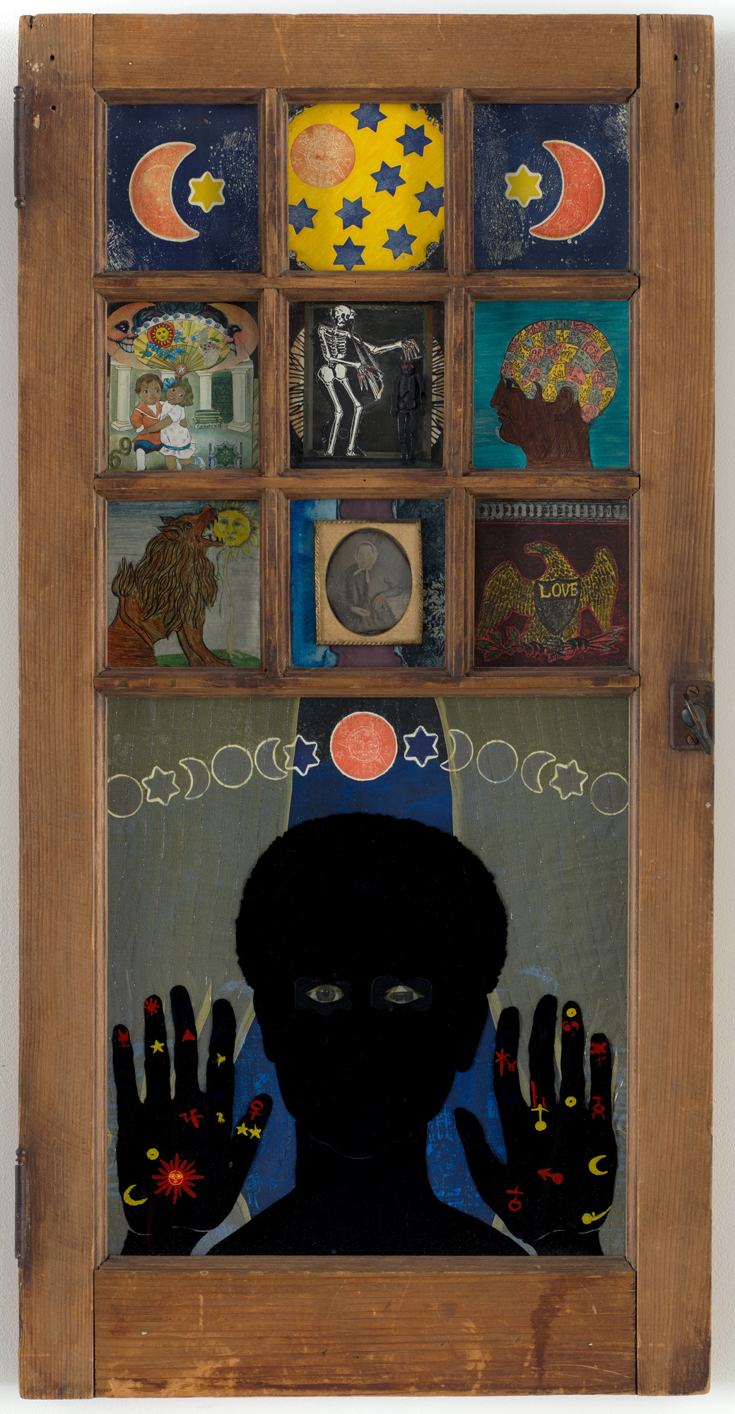Betye Saar. Black Girl’s Window, 1969. Wooden window frame with paint, cut-and-pasted printed and painted papers, daguerreotype, lenticular print, and plastic figurine. 35 3/4 x 18 x 1 1/2" (90.8 x 45.7 x 3.8 cm). Gift of Candace King Weir through The Modern Women's Fund, and Committee on Painting and Sculpture Funds