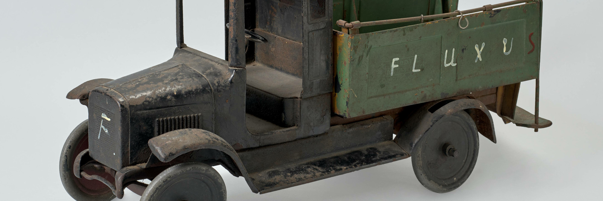 Nam June Paik. 3 F Truck. 1977. Toy truck with paint additions, 12 3/8 x 24 x 8 7/16&#34; (31.5 x 61 x 21.5 cm). The Gilbert and Lila Silverman Fluxus Collection Gift. © 2020 Nam June Paik. Photo: Robert Gerhardt