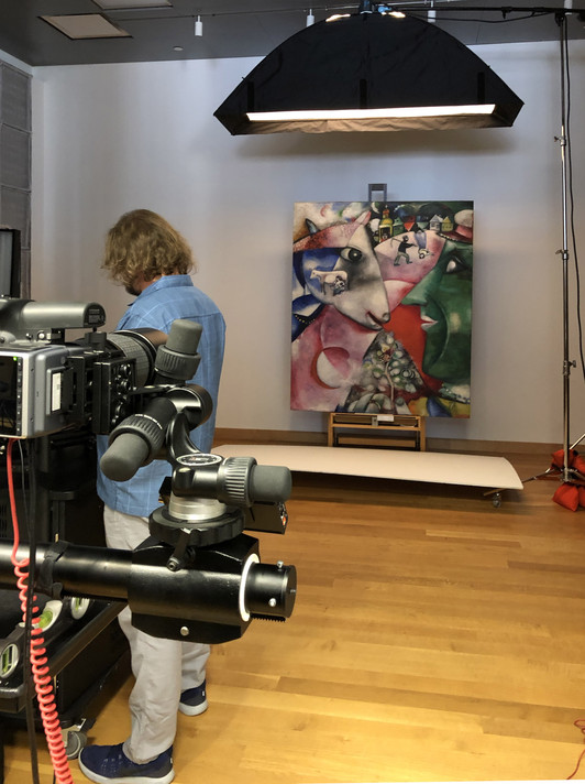 Photography set-up in Paintings Conservation. Photographer Jonathan Muzikar sets up lighting for Marc Chagall’s I and the Village