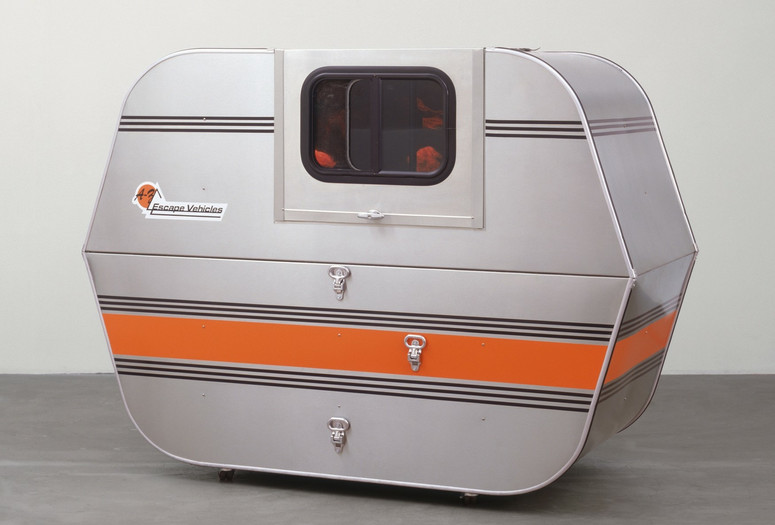 Andrea Zittel. A-Z Escape Vehicle: Customized by Andrea Zittel. 1996. Exterior: steel, insulation, wood and glass. Interior: colored lights, water, fiberglass, wood, papier-mâché, pebbles and paint, 62" × 7' × 40" (157.5 × 213.3 × 101.6 cm). The Norman and Rosita Winston Foundation, Inc. Fund and an anonymous fund. © 2020 Andrea Zittel