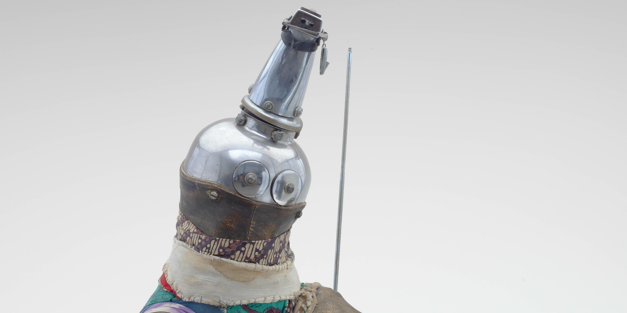John Outterbridge. Broken Dance, Ethnic Heritage Series. c. 1978–82. Stainless steel, wood, leather, sewn cloth, and ammunition box, 34 × 29 1/4 × 33" (86.4 × 74.3 × 83.8 cm). Gift of Marlene Hess and James D. Zirin. © John Outterbridge. Courtesy of the artist’s estate