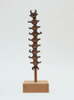 Isamu Noguchi. Small Centipede. c. 1952. Unglazed Karatsu red stoneware and wood, 15 3/4 x 4 3/4 x 4 3/4&#34; (40 x 12.1 x 12.1 cm) including wood base. Gift of Mr. and Mrs. George Heard Hamilton in honor of Richard E. Oldenburg. © 2017 Estate of Isamu Noguchi / Artists Rights Society (ARS), New York. Photo: Paige Knight