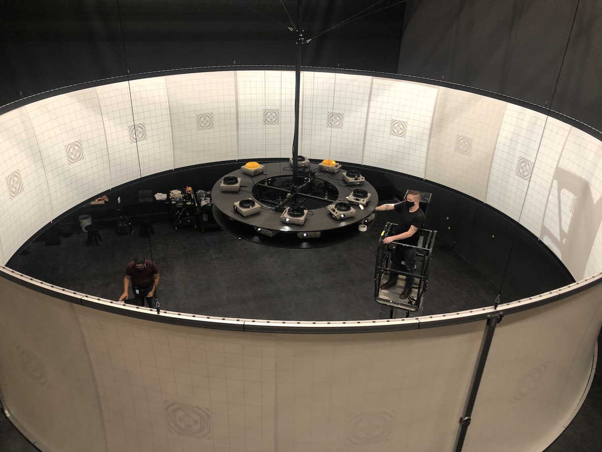 Mitch Leitschuh and Chris Brown installing and aligning the projector images in the Marie Josée and Henry Kravis Studio, July 2020