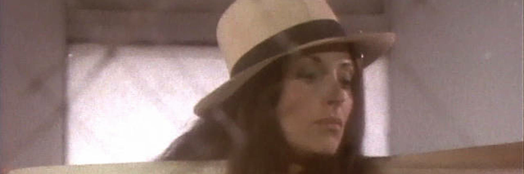 Hannah Wilke. Hannah Wilke Through the Large Glass. 1976. 16mm film transferred to video (color, silent), 10 min. Acquired through the generosity of Courtney Plummer. © 2020 Marsie, Emanuelle, Damon and Andrew Scharlatt - Hannah Wilke Collection and Archive, Los Angeles. Courtesy Electronic Arts Intermix (EAI), New York