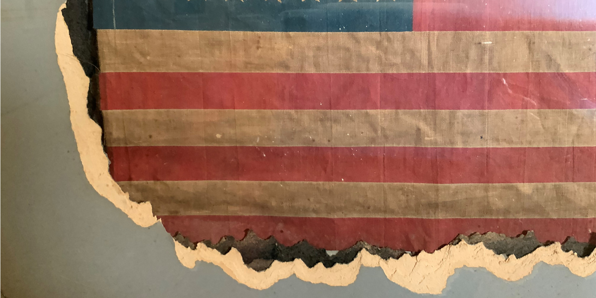 Sari Dienes. Tomb (detail). c. 1953–54.Ink rubbing on paper, fabric flag, and torn colored board,36 × 24&#34; (91.4 × 60.9 cm)Gift of the Sari Dienes Foundation, Inc.