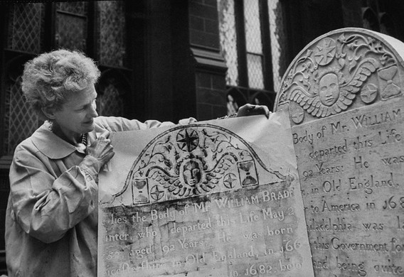 From Life magazine, October 1, 1954: “Tombstone artist Sari Dienes, in grave-yard tracing old tombstone impressions to create her unusual form of art”