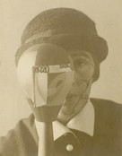 Sophie Taeuber-Arp. Self-Portrait with Dada Head, photograph by Nic Aluf. 1920. Gelatin silver print, 4 1/2 x 3 1/2&#34; (11.4 x 8.9 cm). San Francisco Museum of Modern Art, Fractional and Promised Gift of Carla Emil and Rich Silverstein
