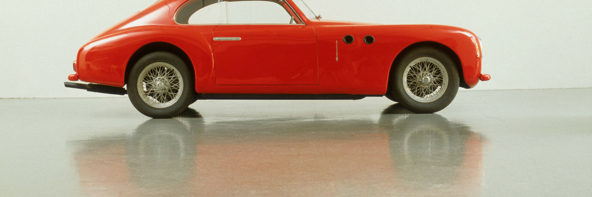 Pininfarina (Battista "Pinin" Farina). Cisitalia 202 GT Car. 1946. Aluminum body, 49 × 57 5/8 × 158" (124.5 × 146.4 × 401.3 cm). Manufacturer: S.p.A. Carrozzeria Pininfarina, Torino, Italy. Gift of the manufacturer