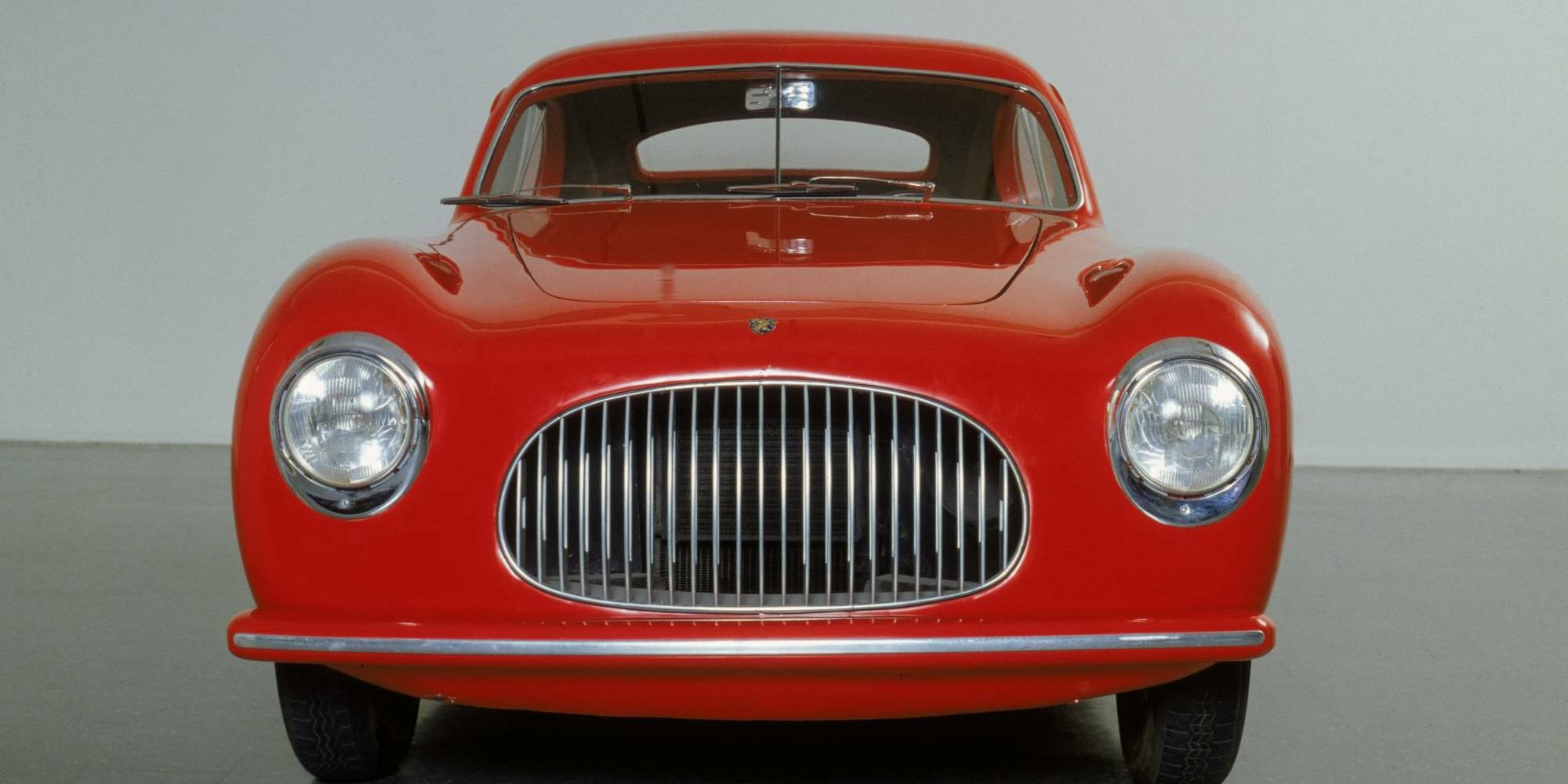 Pininfarina (Battista “Pinin” Farina). Cisitalia 202 GT Car. 1946. S.p.A. Carrozzeria Pininfarina, Torino, Italy. Aluminum body, glass, rubber, and other materials, 49 × 57 5/8 × 158&#34; (124.5 × 146.4 × 401.3 cm). Gift of the manufacturer