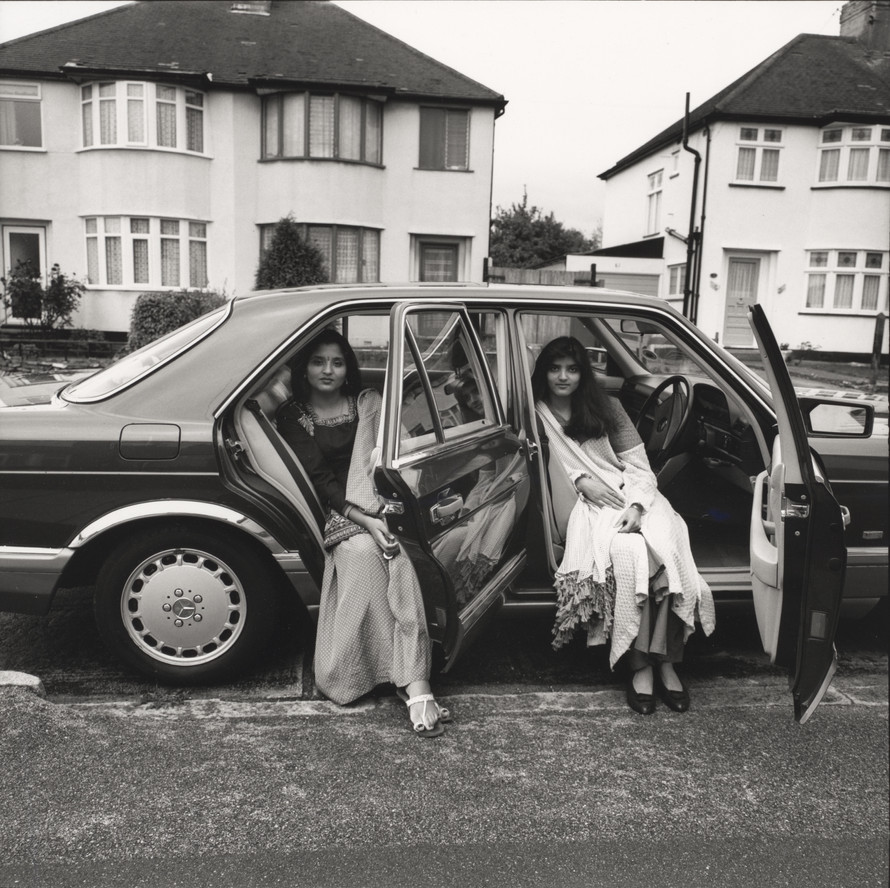 Ketaki Sheth. Shilpa and Sheetal in their car, Harrow, Middlesex. 1995