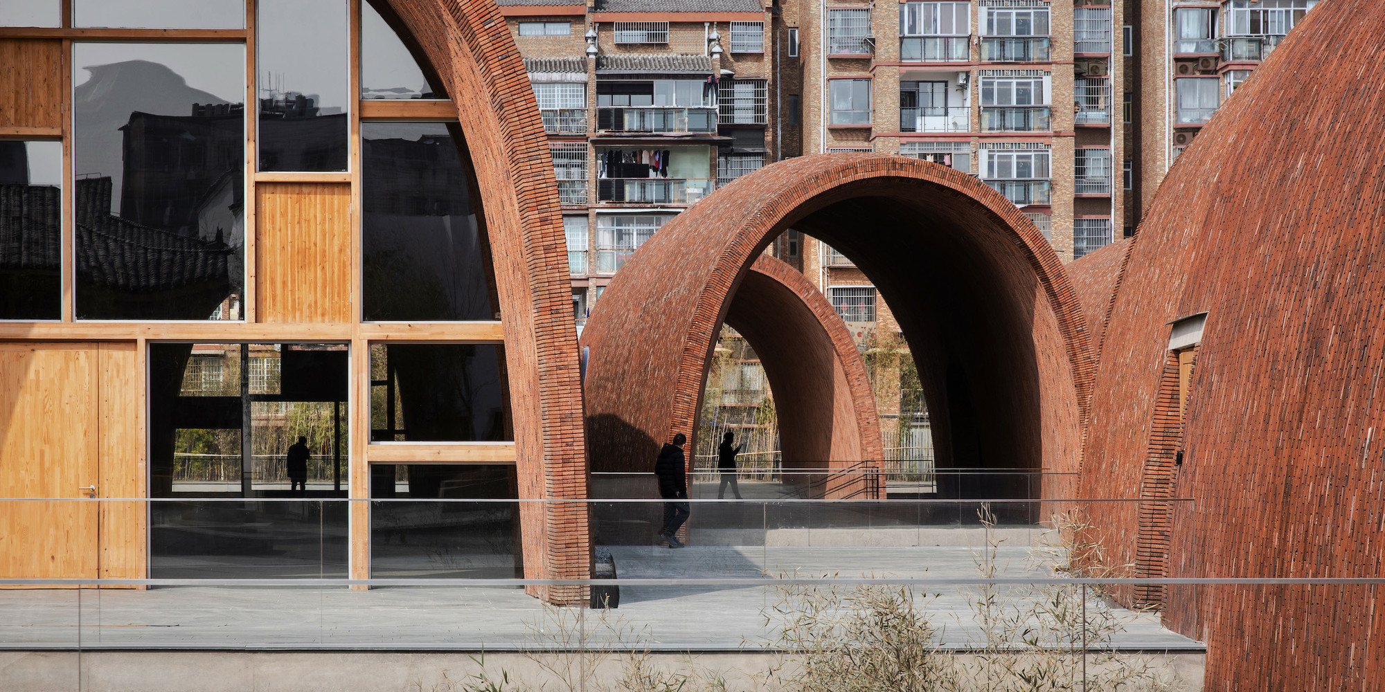 Studio Zhu-Pei, Zhu Pei. Jingdezhen Imperial Kiln Museum, Jingdezhen, Jiangxi, China. 2016–20. View toward the open vaults. Photo: schranimage. Courtesy Studio Zhu-Pei. © 2021 Zhu Pei