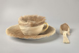 Meret Oppenheim. Object. 1936. Fur-covered cup, saucer, and spoon; cup 4 3/8" (10.9 cm) in diameter; saucer 9 3/8" (23.7 cm) in diameter; spoon 8" (20.2 cm) long, overall height 2 7/8" (7.3 cm). Purchase. © 2021 Artists Rights Society (ARS), New York/Pro Litteris, Zurich