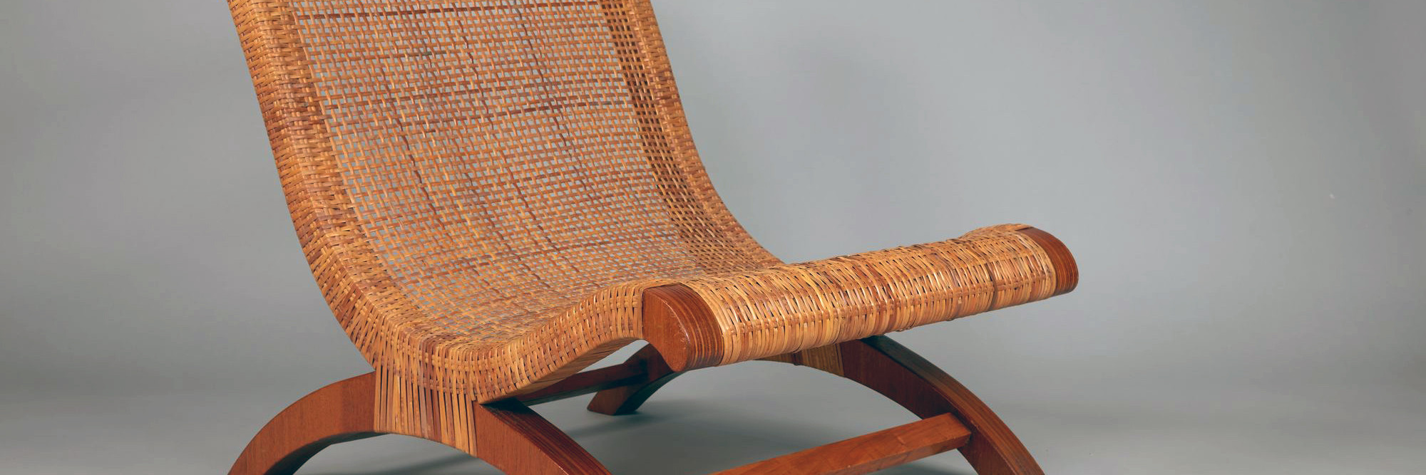 Clara Porset. Butaque. c. 1957. Laminated wood and woven wicker, 28 3/4 × 25 13/16 × 33 7/16&#34; (73 × 65.6 × 84.9 cm). Gift of The Modern Women’s Fund