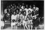 Textile students in the Applied-Arts Department of Zurich’s Trade School, with teachers Alice Frey-Amsler and Sophie Taeuber-Arp (standing, at center)