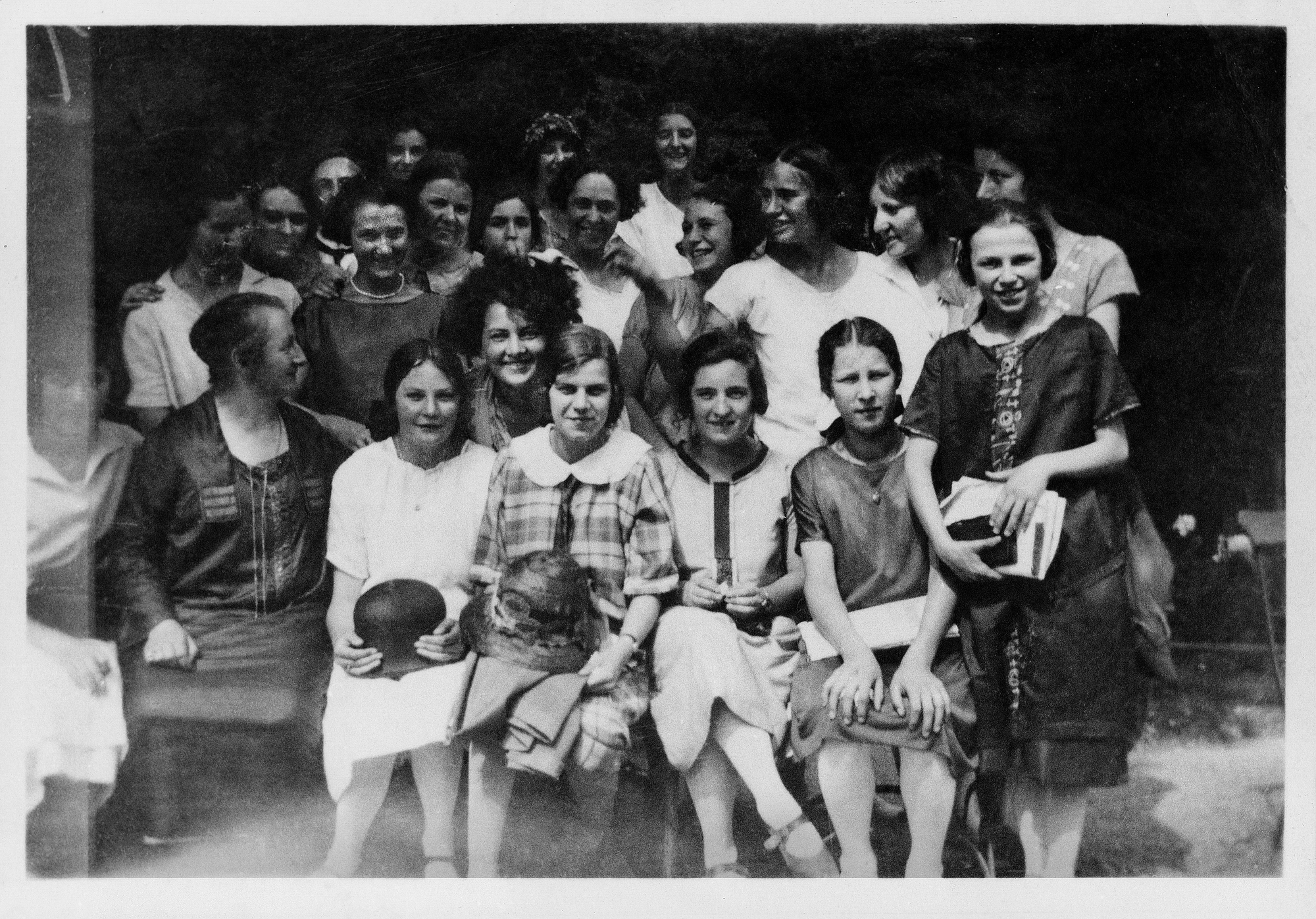 Textile students in the Applied-Arts Department of Zurich’s Trade School, with teachers Alice Frey-Amsler and Sophie Taeuber-Arp (standing, at center)