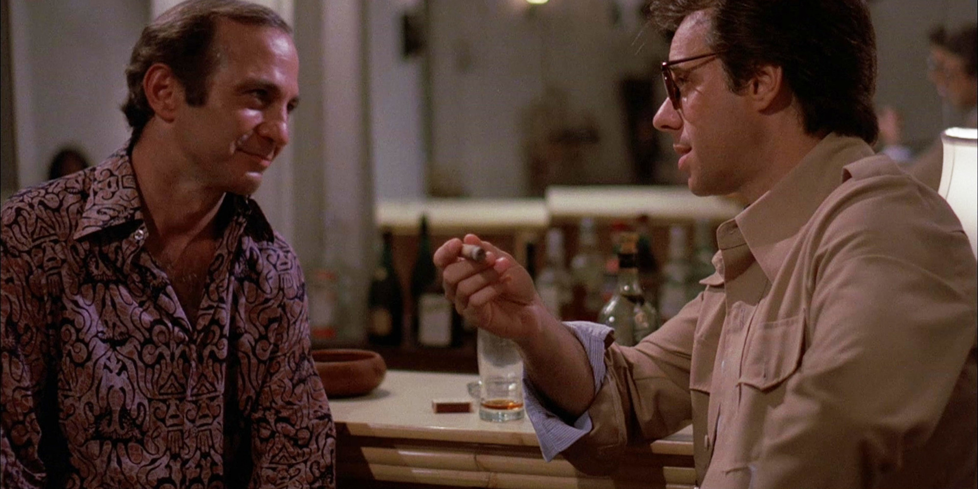 Bogdanovich (at right) with Ben Gazzara in Saint Jack. 1979. USA. Directed by Peter Bogdanovich. Courtesy American Genre Film Archive