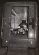 Weegee (Arthur Fellig). Self Portrait in Police Van. c. 1940. Gelatin silver print, 12 9/16 × 8 15/16&#34; (32 × 22.7 cm). Gift of the artist