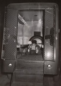 Weegee (Arthur Fellig). Self Portrait in Police Van. c. 1940. Gelatin silver print, 12 9/16 × 8 15/16&#34; (32 × 22.7 cm). Gift of the artist