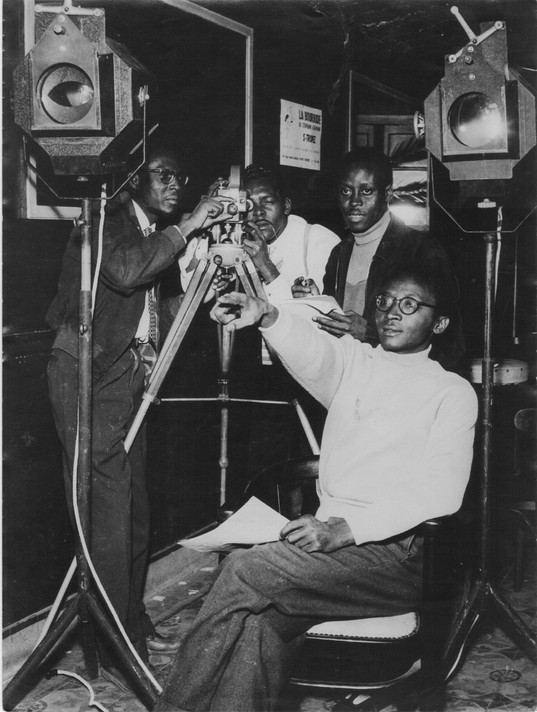 Paulin Soumanou Vieyra, Robert Caristan, Jacques Mélo Kane, and Mamadou Sarr on the set of Afrique sur Seine, 1955